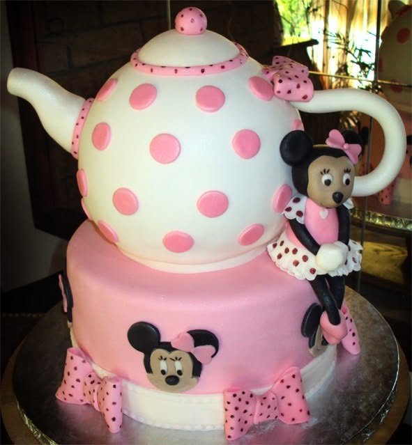 Playful novelty cake shaped like a teapot