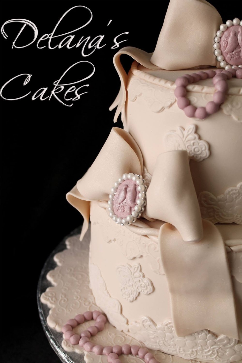 Elegant tiered cake with soft decorative details